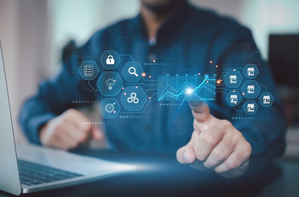 man selecting from digital screen